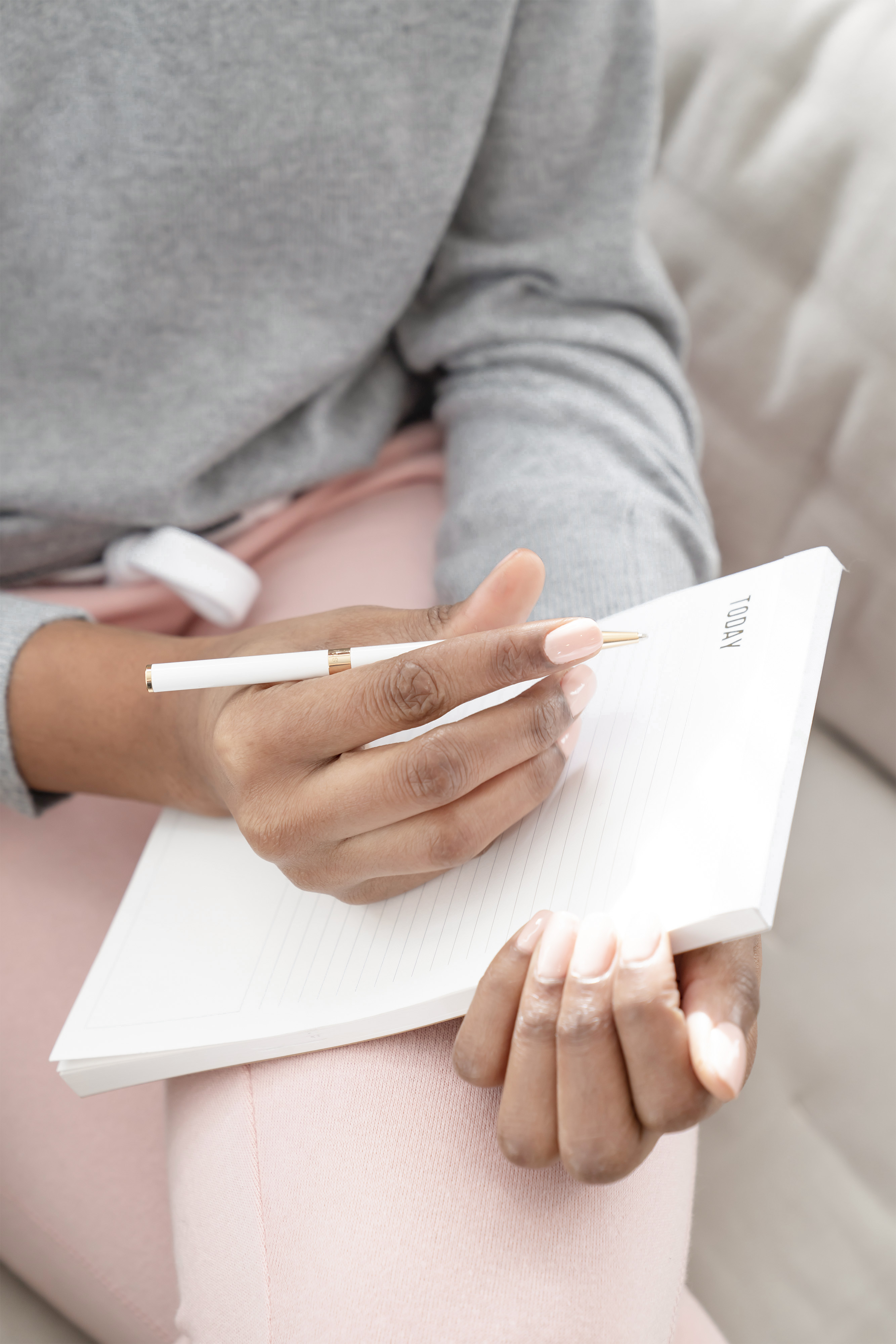 Creating a list on paper for 10 things to do today to start a virtual assistant business.